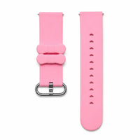 Pink watch strap with silver buckle on a white background