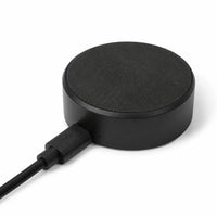 Bottom of Lil Tracker portable charging dock showing rubber non-slip base