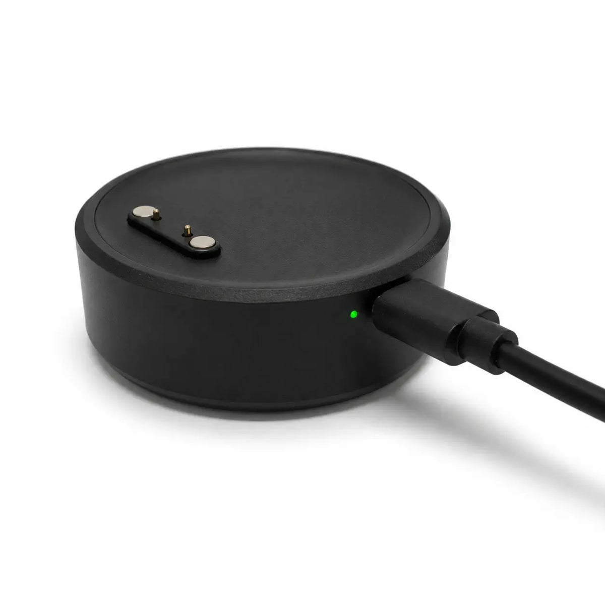 Portable Lil Tracker charging dock plugged in with green indicator light